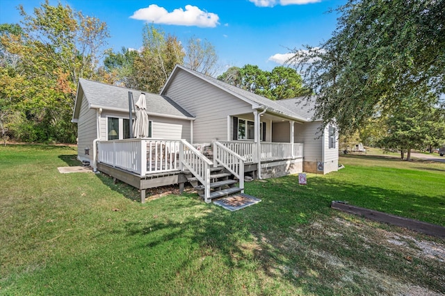 back of house featuring crawl space, a lawn, a wooden deck, and roof with shingles