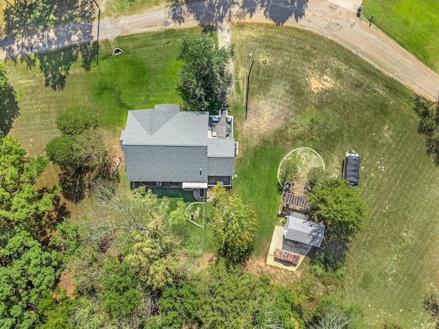 birds eye view of property with a rural view