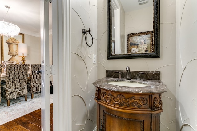 bathroom featuring wood-type flooring and vanity