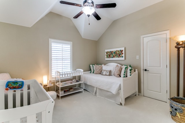 carpeted bedroom with lofted ceiling and ceiling fan