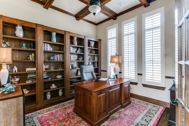 home office featuring ornamental molding, beamed ceiling, hardwood / wood-style flooring, and ceiling fan