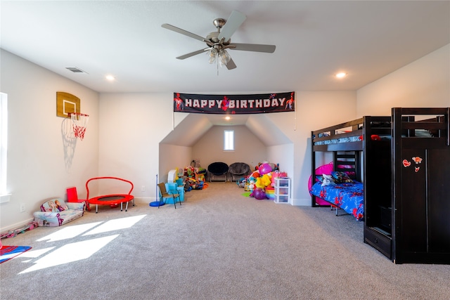 game room with carpet and ceiling fan