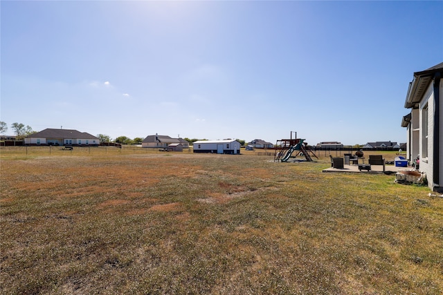 view of yard with a playground