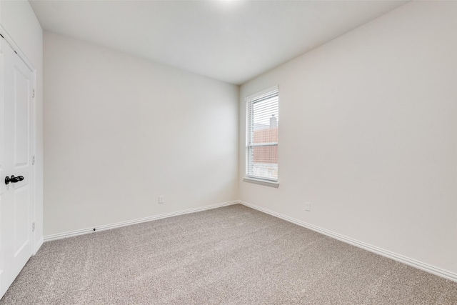 spare room with carpet flooring