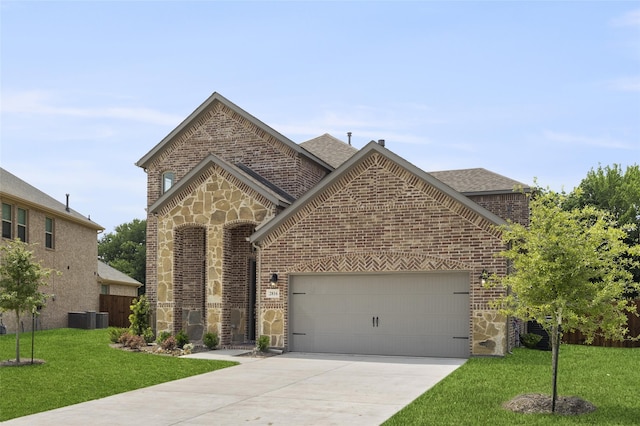 view of front facade featuring a front lawn and a garage