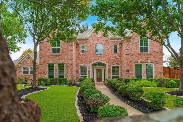 view of front of home featuring a front yard