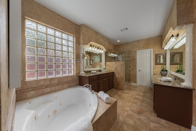 bathroom with vanity and plus walk in shower