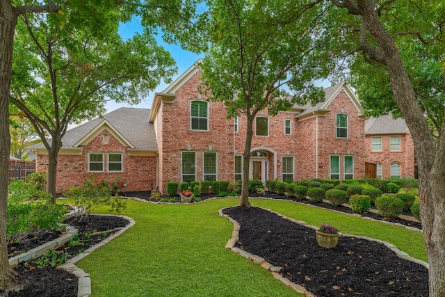 view of front of home with a front lawn