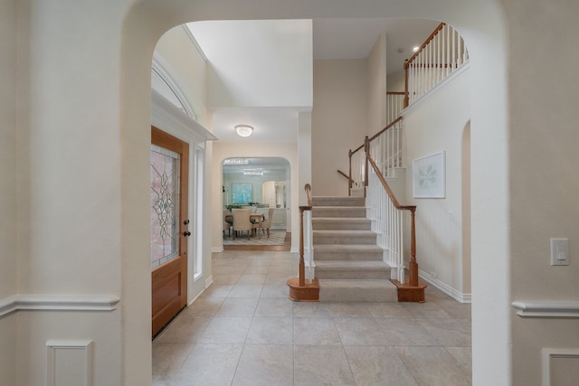 foyer featuring light tile patterned flooring