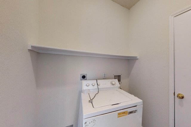 laundry room featuring washer / dryer