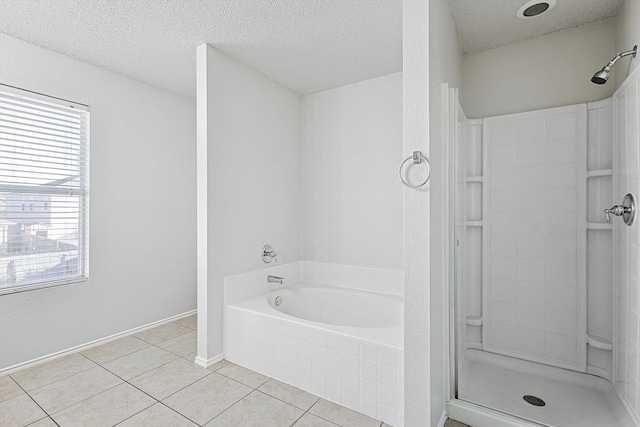 2121 Franks St, Fort Worth, TX 76177 - bathroom with tile patterned flooring, a shower stall, a textured ceiling, and a bath