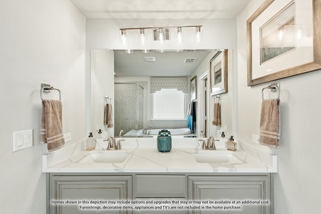 bathroom featuring vanity and separate shower and tub