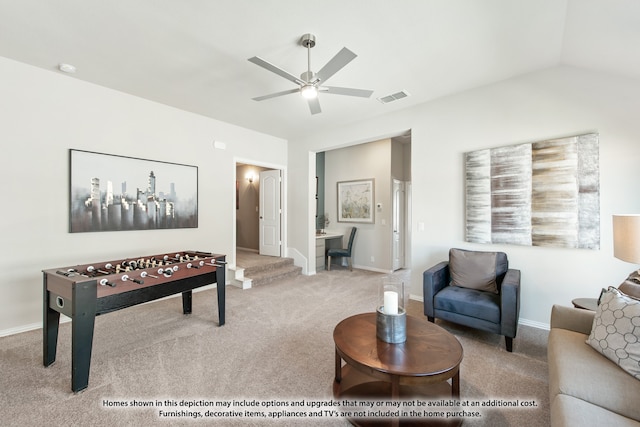 living room with lofted ceiling, carpet flooring, and ceiling fan