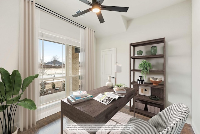 home office with baseboards, a ceiling fan, and wood finished floors