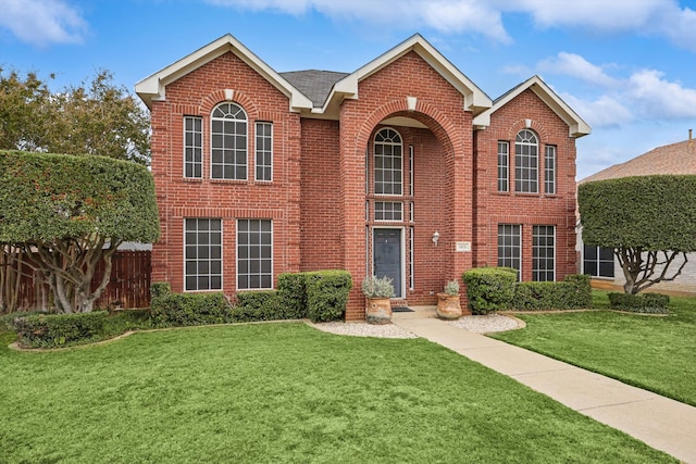 view of property with a front lawn