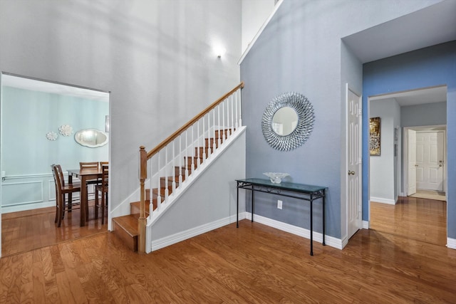 stairway featuring hardwood / wood-style floors