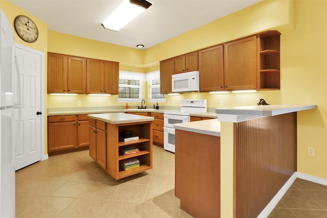 502 Smith Oak Rd, Sherman, TX 75090 - kitchen featuring open shelves, white appliances, a peninsula, and light countertops