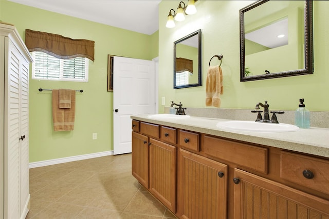 502 Smith Oak Rd, Sherman, TX 75090 - bathroom featuring tile patterned flooring, double vanity, and baseboards
