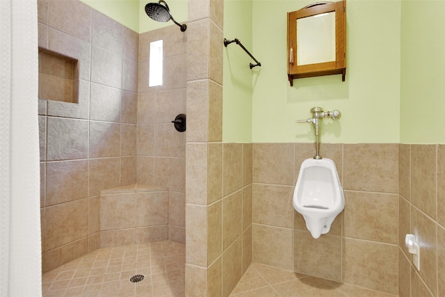 502 Smith Oak Rd, Sherman, TX 75090 - bathroom with a tile shower and a wainscoted wall