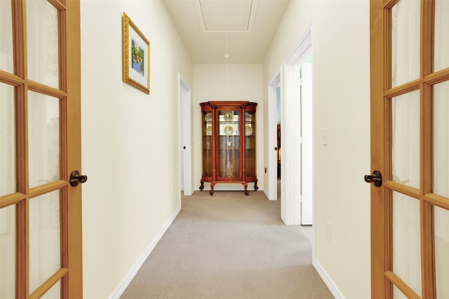 corridor with light carpet