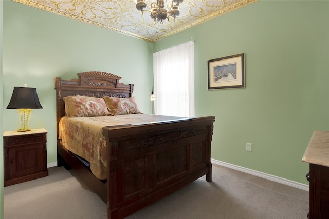 bedroom with light carpet and a notable chandelier