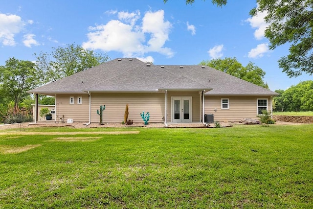 502 Smith Oak Rd, Sherman, TX 75090 - back of property featuring french doors, central air condition unit, and a lawn