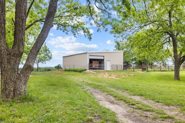 502 Smith Oak Rd, Sherman, TX 75090 - view of yard featuring an outbuilding, a garage, and an exterior structure