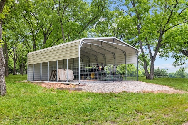 502 Smith Oak Rd, Sherman, TX 75090 - view of outdoor structure featuring a carport and driveway