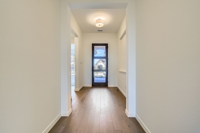 entryway featuring dark wood-type flooring