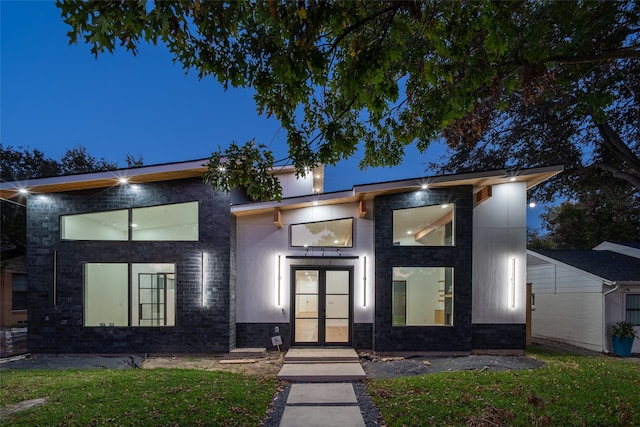 property entrance featuring french doors