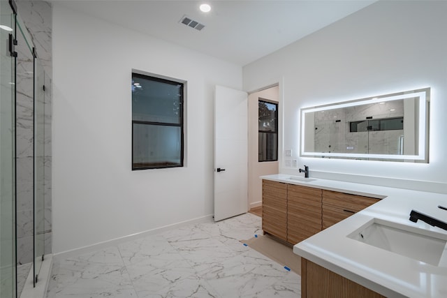 full bathroom with tiled shower / bath, tile patterned flooring, vanity, and toilet