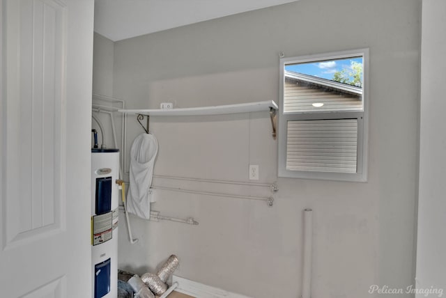 bathroom featuring electric water heater