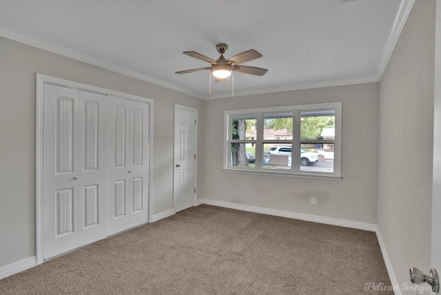 unfurnished bedroom with ceiling fan, light carpet, and ornamental molding