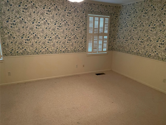 empty room featuring carpet