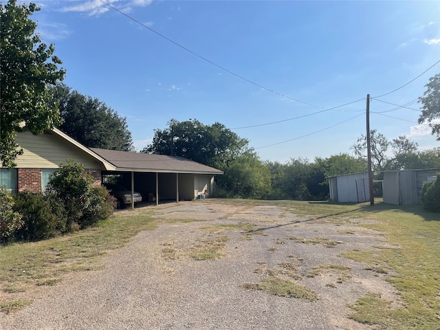 view of yard featuring a carport