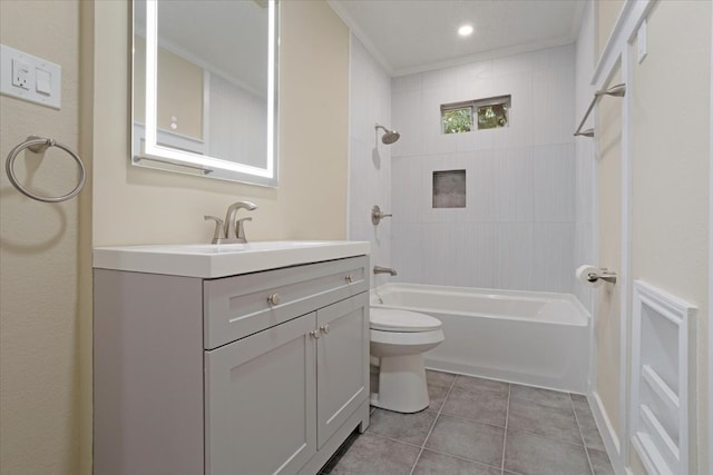 full bathroom featuring toilet, tile patterned floors, tiled shower / bath, vanity, and ornamental molding