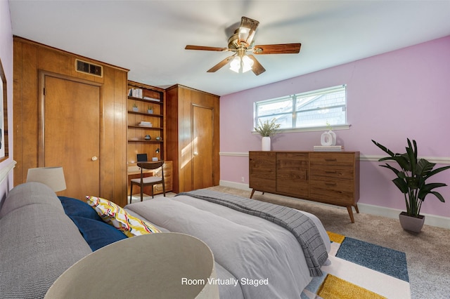 carpeted bedroom featuring ceiling fan