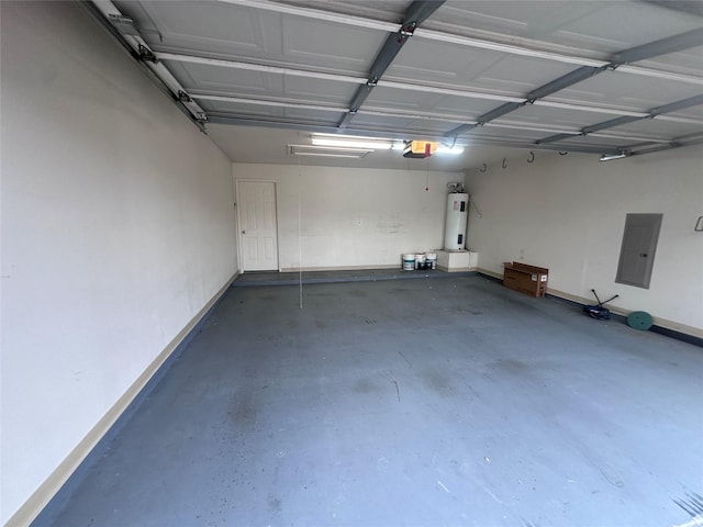 garage with a garage door opener, electric panel, and electric water heater