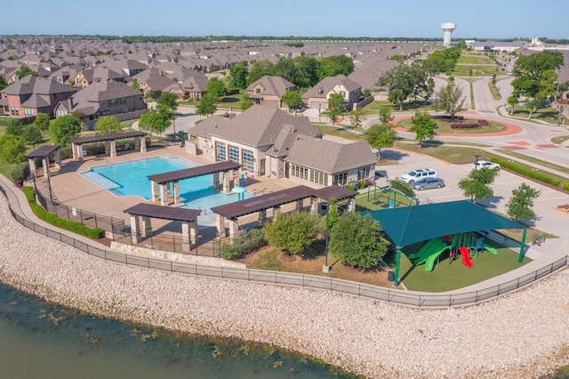 drone / aerial view with a water view