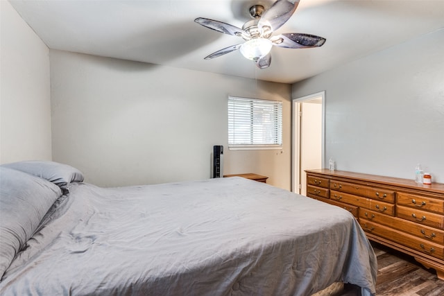 bedroom with hardwood / wood-style flooring and ceiling fan