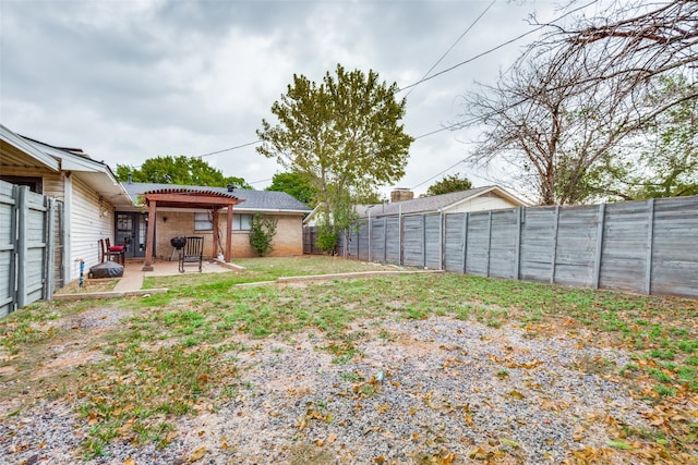 view of yard with a patio area