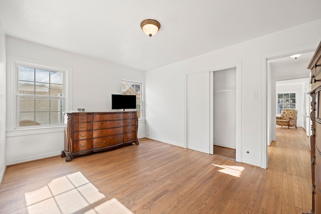 bedroom with light hardwood / wood-style floors