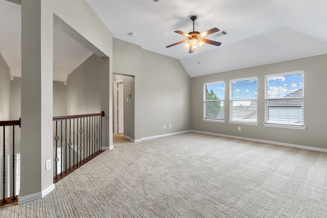 unfurnished room featuring light carpet, ceiling fan, and lofted ceiling