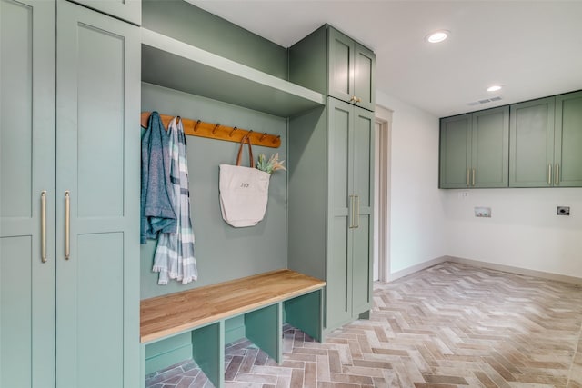 mudroom with baseboards, visible vents, and recessed lighting