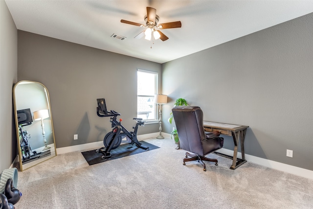 carpeted office with ceiling fan