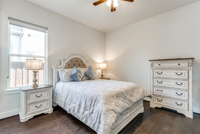 bedroom featuring ceiling fan and dark hardwood / wood-style flooring