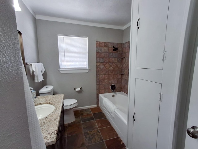 full bathroom featuring vanity, toilet, crown molding, and tiled shower / bath combo