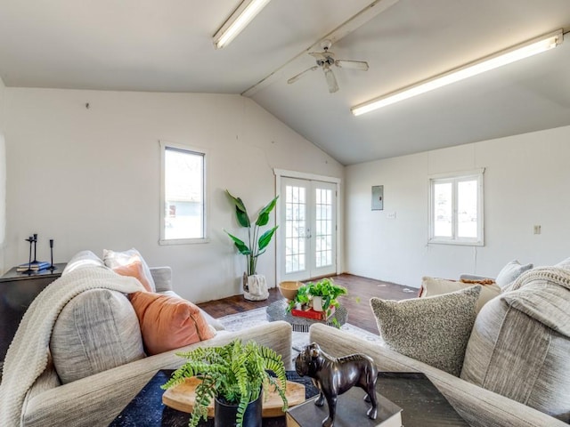 living room featuring french doors, wood-type flooring, electric panel, and vaulted ceiling