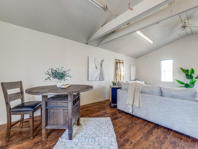 dining area with dark wood-type flooring, ceiling fan, and vaulted ceiling