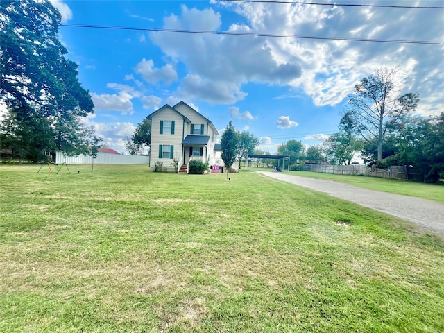 view of front facade with a front yard